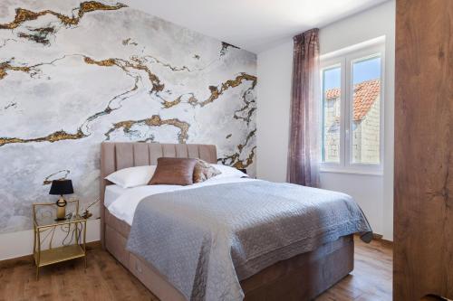 Posteľ alebo postele v izbe v ubytovaní Cozy Apartment Lile in the heart of old town Split