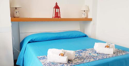 Una cama o camas en una habitación de Mowita