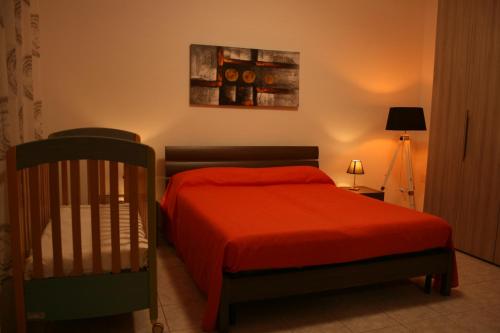 Een bed of bedden in een kamer bij La casa dei nonni