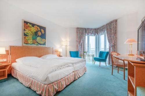 Postel nebo postele na pokoji v ubytování Landhotel Bellevue