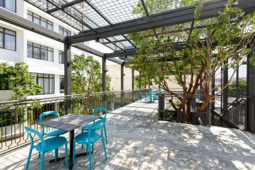 Un balcón o terraza en SAVV HOTEL