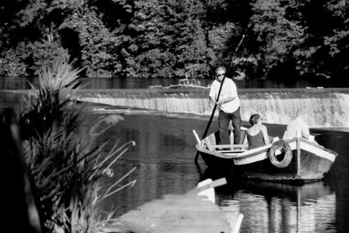 a man and a woman in a boat on the water at B&B Eridu in Fiesole