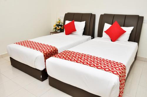 Ένα ή περισσότερα κρεβάτια σε δωμάτιο στο Hotel Raub Agro