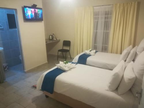 Katil atau katil-katil dalam bilik di revival guest house