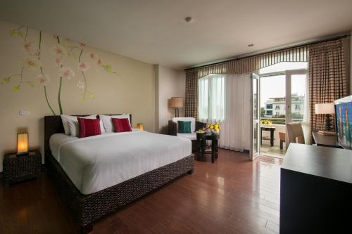 Giường trong phòng chung tại Anise Hotel & Spa Hanoi