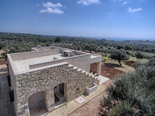 a stone house with a view at Piccante Seaview by LoveSud in Patù
