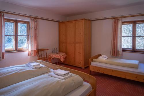 Säng eller sängar i ett rum på Hotel Restaurant Alatsee