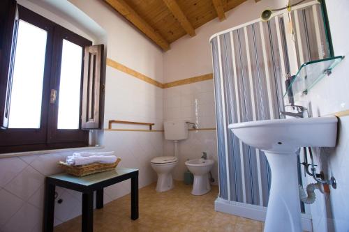 Een badkamer bij Experience Il Paesino
