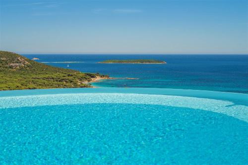 an aerial view of a body of water at Résidence Belvedere de Palombaggia in Porto-Vecchio