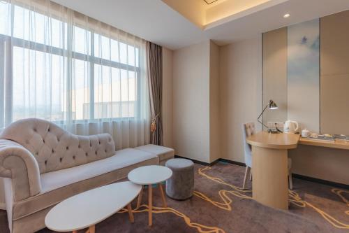 Χώρος καθιστικού στο Taishan He Style Hotel