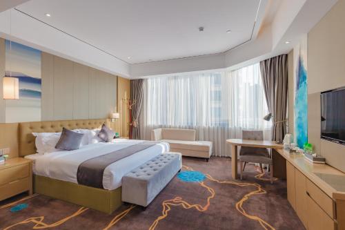 Postel nebo postele na pokoji v ubytování Taishan He Style Hotel