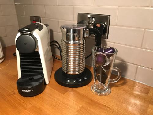 a black and white blender and a glass on a counter at Pottery Gate, Bowness-on-Windermere in Bowness-on-Windermere