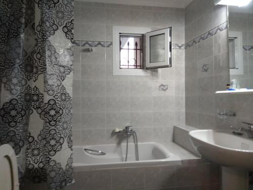 A bathroom at Villa Agnanti Apts and Suites