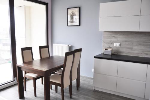 Kuchyňa alebo kuchynka v ubytovaní Kościuszki 28 A by Homeprime