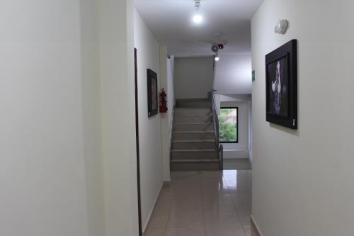 TV a/nebo společenská místnost v ubytování Hotel La Cultura