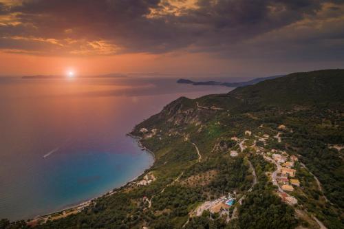 an aerial view of the amalfi coast at sunset at Arilla Beach Hotel in Perdika