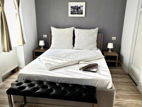 Ein Bett oder Betten in einem Zimmer der Unterkunft Hotel Garni Steinbacher Tal