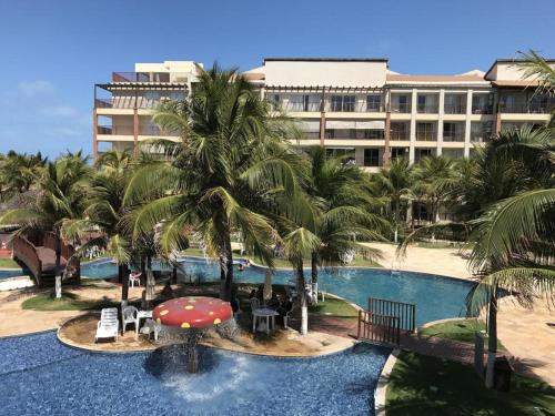 Bazén v ubytování Apartamento Completo no Beach Living Porto das Dunas - Apto Luxo nebo v jeho okolí