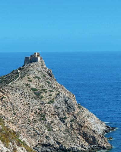 an island in the ocean with a castle on it at Villa Pirreca in Favignana
