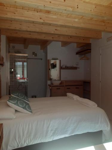 Postel nebo postele na pokoji v ubytování Casa Choupas