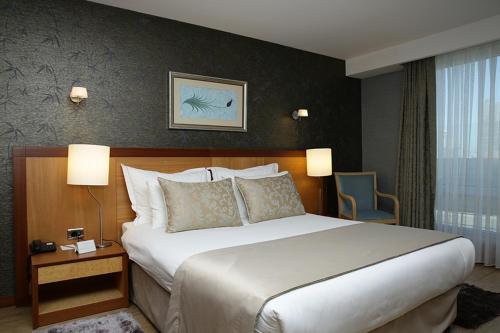 Кровать или кровати в номере Byotell Hotel Istanbul