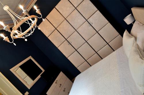 Albergo Diffuso Dimora Rossi B&Bにあるベッド