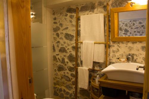 Ett badrum på Quinta do Tempo Turismo Rural