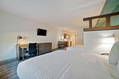Кровать или кровати в номере Extended Stay America Premier Suites - Greenville - Woodruff Road