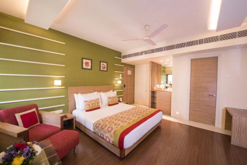 Postel nebo postele na pokoji v ubytování Hotel Bawa Suites