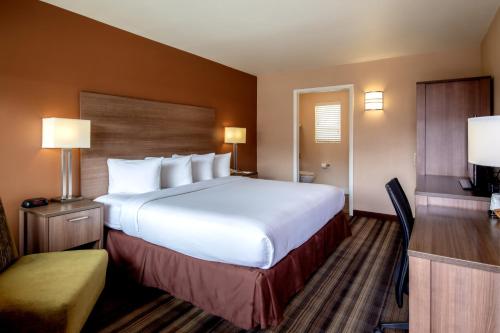 Llit o llits en una habitació de Boulder University Inn
