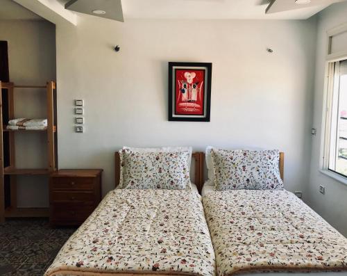Postel nebo postele na pokoji v ubytování Studio Medina