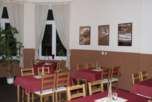 
A restaurant or other place to eat at Penzión Poľana
