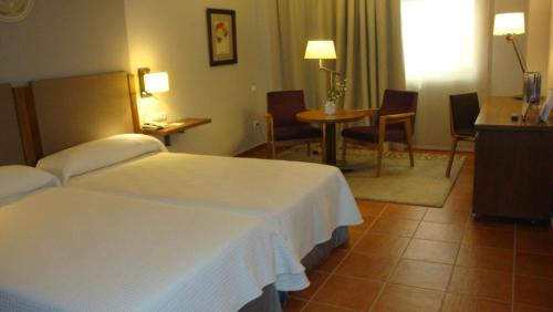 Katil atau katil-katil dalam bilik di Parador de Lorca