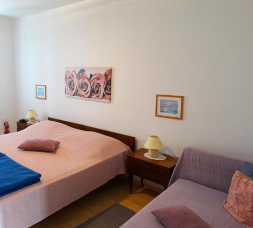 Cama ou camas em um quarto em Apartments Iva