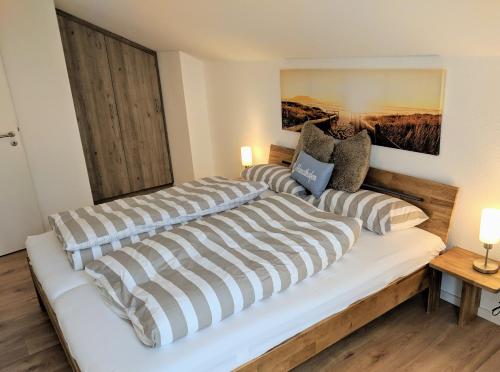 Posteľ alebo postele v izbe v ubytovaní Ferienwohnungen Arp - Haus Anton