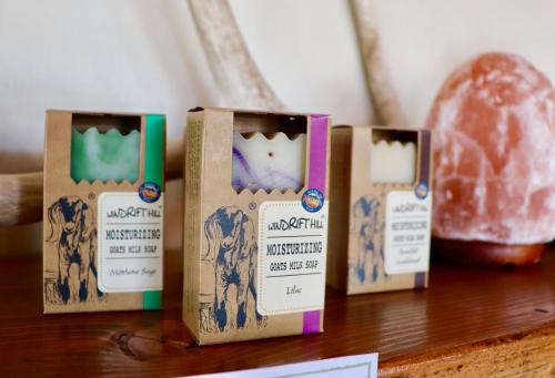 three packs of soap sitting on top of a table at Evergreen Motel in Libby