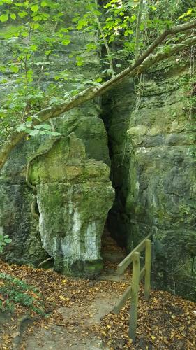 a cave in the side of a large rock at Medehamstede Hotel in Shanklin