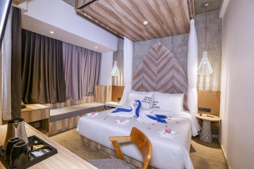 מיטה או מיטות בחדר ב-Marc Hotel Gili Trawangan