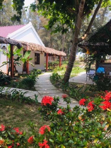 Κήπος έξω από το Hoi An Blue Seaside Homestay