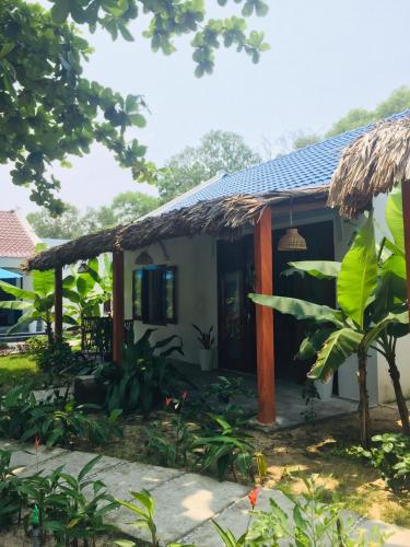 Κήπος έξω από το Hoi An Blue Seaside Homestay