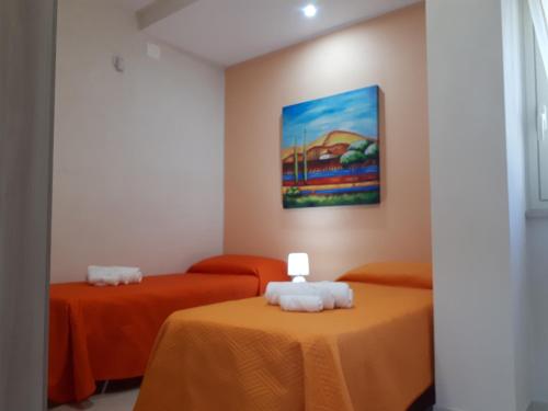 Letto o letti in una camera di Casa Vacanza Demi