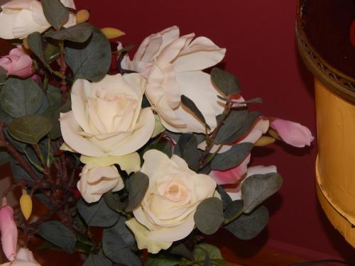 a bouquet of white roses in a vase at Athens-Plaka, Peter’s beautiful apartment in Temple of Zeus in Athens