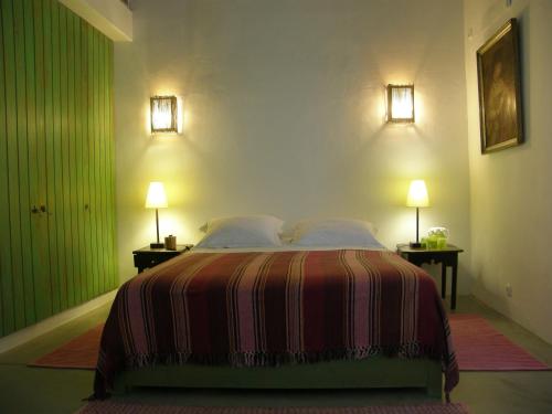 Postel nebo postele na pokoji v ubytování Casa da Ermida de Santa Catarina