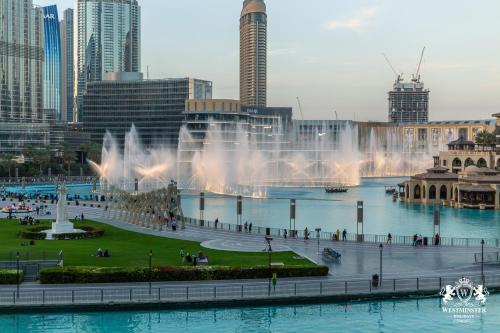 a view of a city with a fountain at Westminster Burj Residences in Dubai