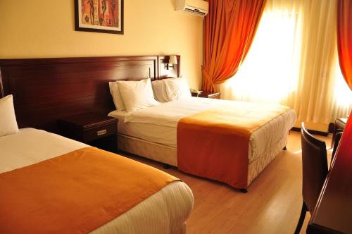 Postel nebo postele na pokoji v ubytování Eser Diamond Hotel Spa & Convention Center İstanbul