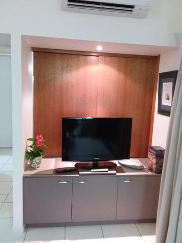 A television and/or entertainment center at Jackies City Central Apartment