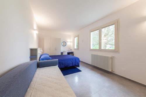 Postel nebo postele na pokoji v ubytování Rose Canine B&B