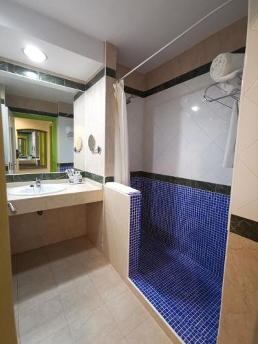 Koupelna v ubytování Hotel Puntazo II