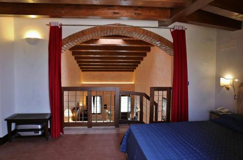 A bed or beds in a room at Case Vacanza SANT'AGOSTINO Siracusa