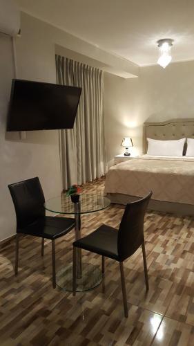 Terraza Apart Hotelにあるベッド